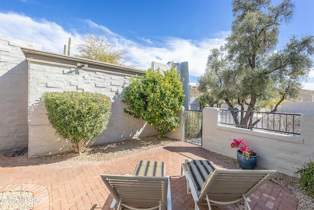7471 E Serenity Ln, Tucson, AZ 85750 - view of patio with a gate