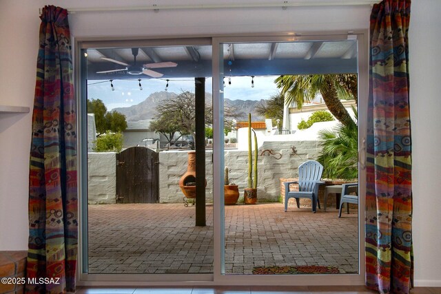 view of patio / terrace featuring a gate and fence