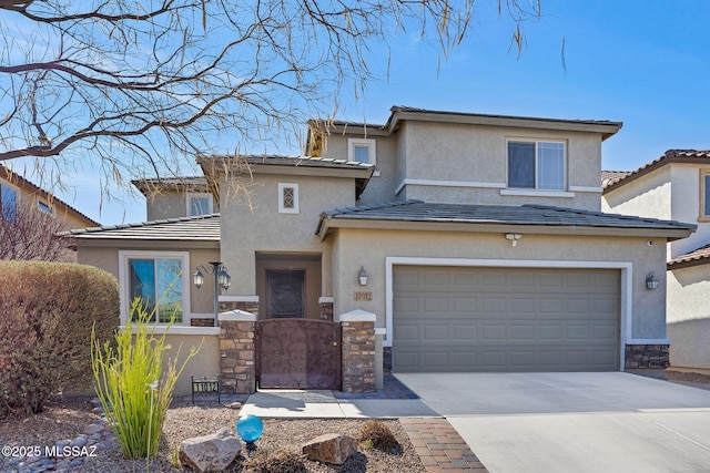 view of front of property with stone siding, driveway, an attached garage, and stucco siding