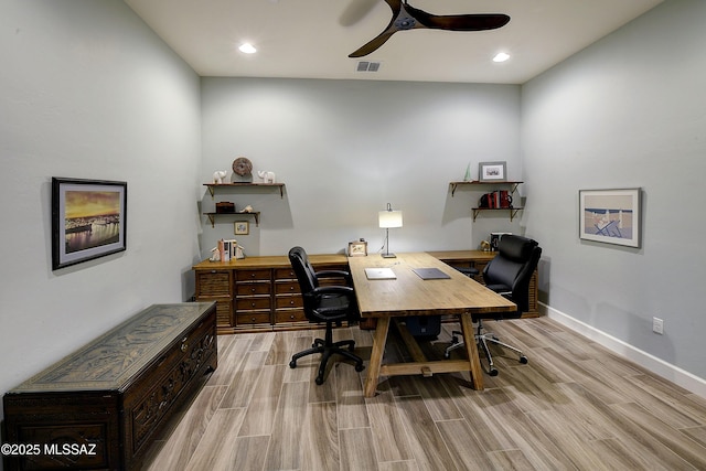 office space with visible vents, baseboards, light wood-style flooring, ceiling fan, and recessed lighting