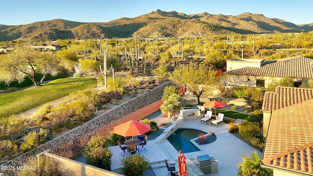 bird's eye view with a mountain view