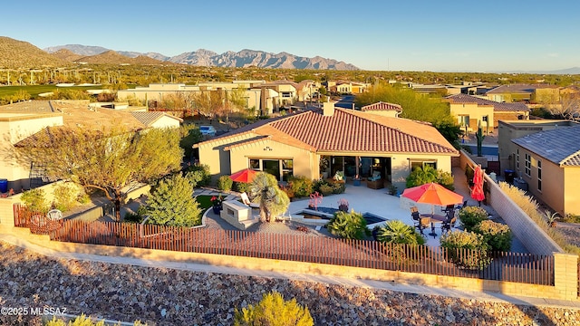 aerial view featuring a residential view and a mountain view