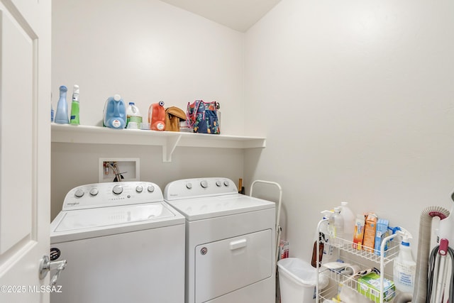 laundry area with laundry area and separate washer and dryer