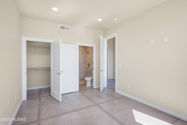 unfurnished bedroom featuring finished concrete flooring, baseboards, visible vents, a closet, and recessed lighting