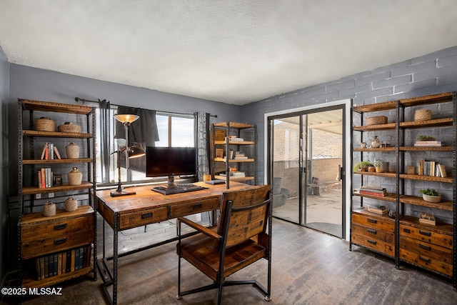 office featuring a textured ceiling and wood finished floors