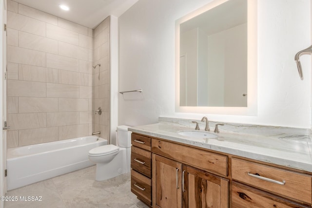 full bathroom with tub / shower combination, vanity, toilet, and tile patterned floors