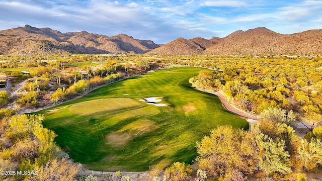 exterior space featuring view of golf course and a mountain view