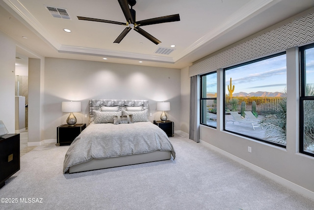 bedroom with recessed lighting, a raised ceiling, visible vents, and baseboards