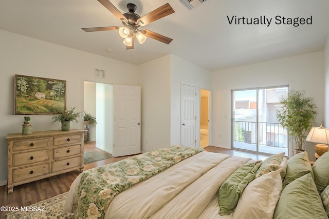 bedroom featuring a ceiling fan, wood finished floors, visible vents, and access to exterior