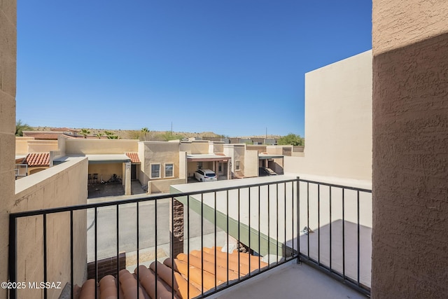 balcony featuring a grill and a residential view