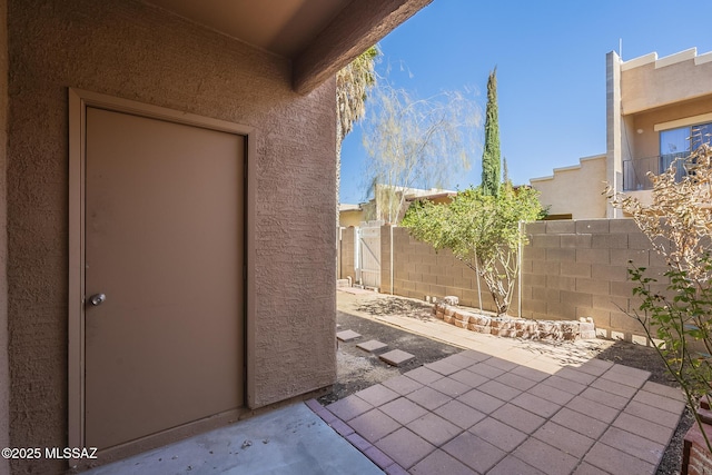 view of patio with fence