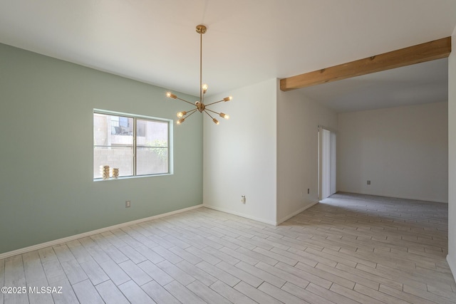 unfurnished room with a chandelier, beamed ceiling, wood finished floors, and baseboards