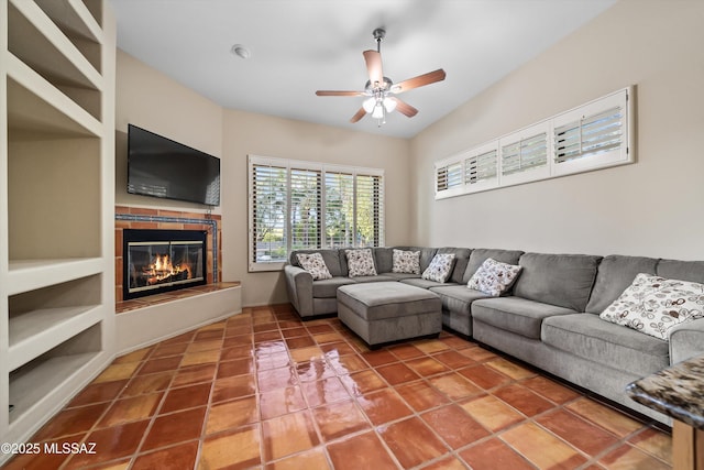 tiled living room with ceiling fan