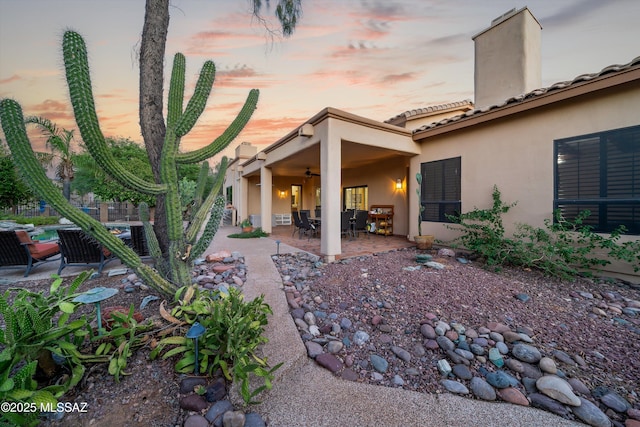 exterior space featuring a patio and ceiling fan