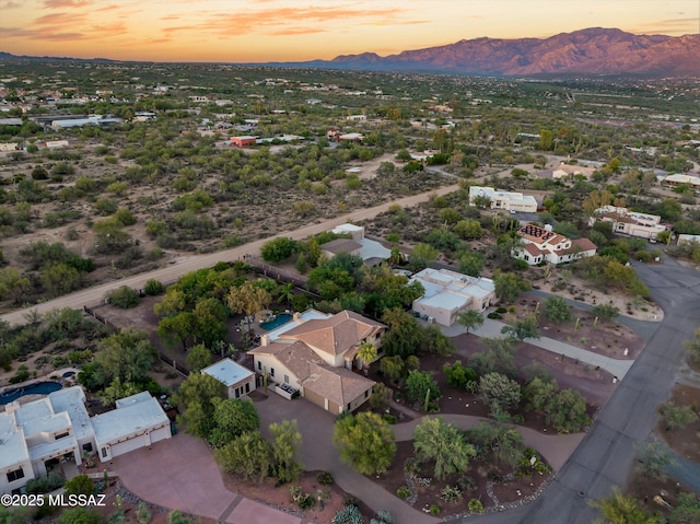 aerial view at dusk with a mountain view