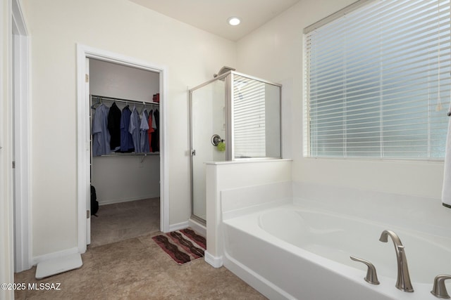 bathroom featuring plus walk in shower