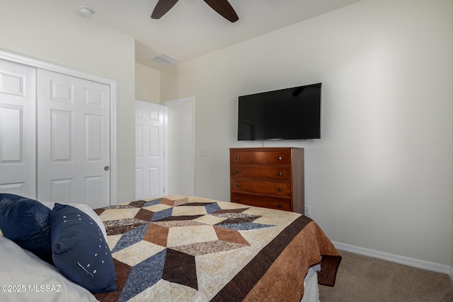 bedroom featuring carpet floors, a closet, and ceiling fan