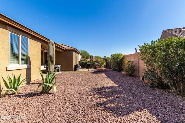 view of yard with a patio area