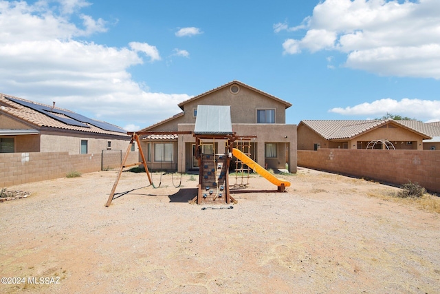 view of jungle gym featuring a fenced backyard