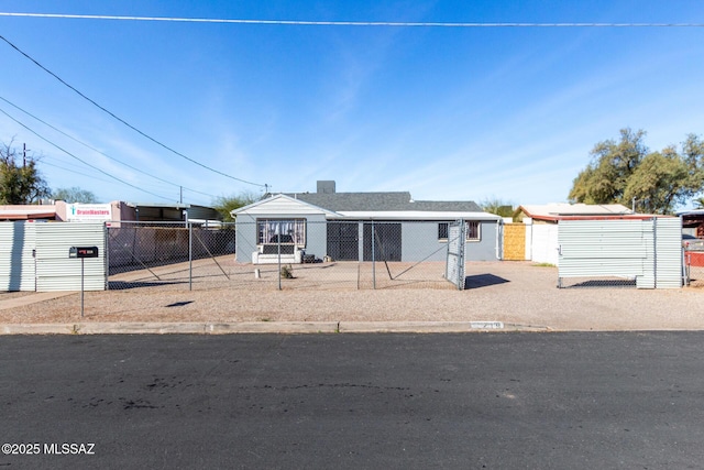 view of front of house with fence