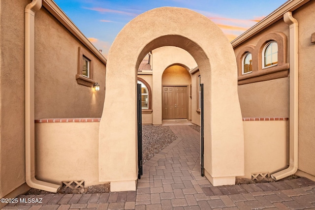 exterior space with arched walkways