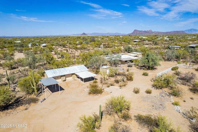 aerial view with a mountain view and a desert view