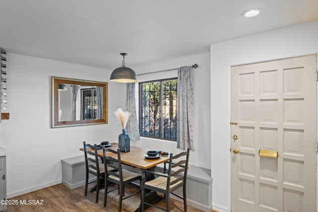 235 N Tucson Blvd, Tucson, AZ 85716 - dining space featuring baseboards and wood finished floors