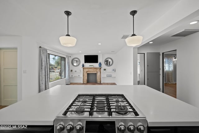 235 N Tucson Blvd, Tucson, AZ 85716 - kitchen featuring light wood finished floors, stainless steel gas cooktop, a sink, and open shelves