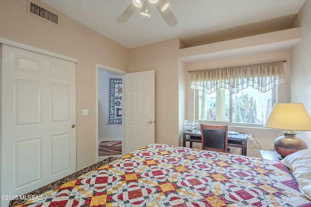 bedroom with visible vents and a ceiling fan