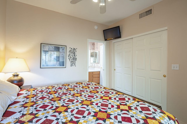 bedroom with ceiling fan, visible vents, and a closet