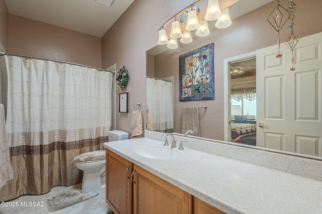 full bath featuring toilet, ensuite bath, and vanity