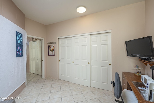 office with light tile patterned floors