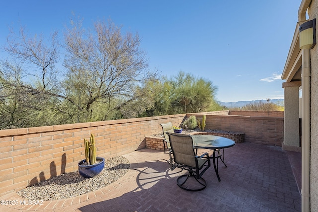 view of patio / terrace with a fenced backyard and outdoor dining area