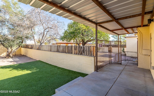 view of patio featuring a fenced backyard