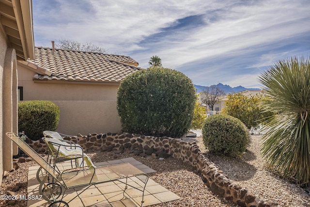 view of patio with a mountain view