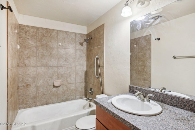 full bath featuring toilet, shower / washtub combination, and vanity