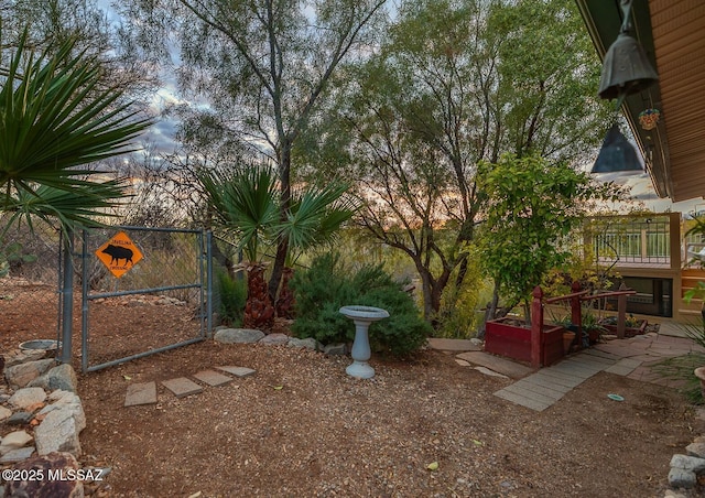 view of yard with a gate and fence