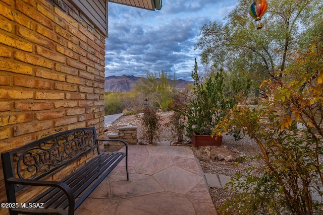 view of patio featuring a mountain view