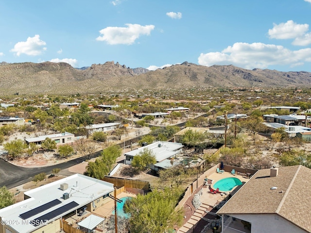 drone / aerial view featuring a mountain view