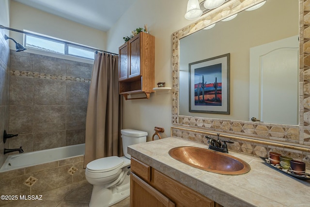 full bathroom featuring tiled shower / bath, backsplash, toilet, and vanity