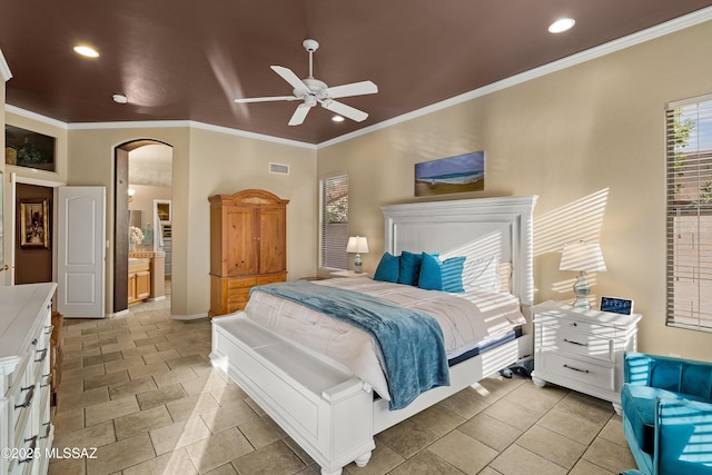 bedroom with visible vents, arched walkways, and ornamental molding