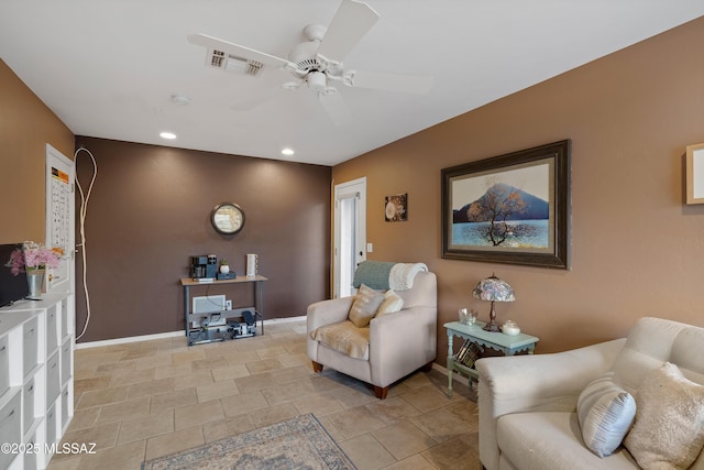 living area with recessed lighting, visible vents, ceiling fan, and baseboards