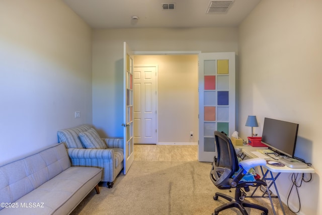 office space with carpet floors and visible vents