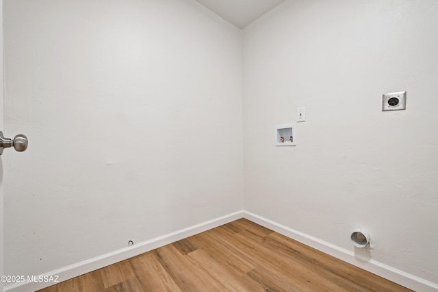 laundry area featuring hookup for a washing machine, hookup for a gas dryer, hookup for an electric dryer, laundry area, and wood finished floors