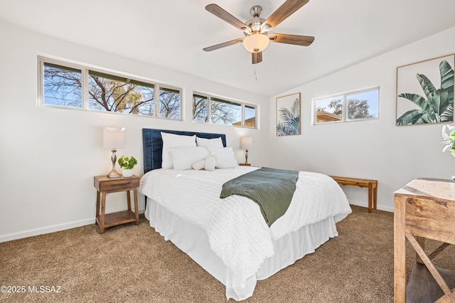 carpeted bedroom featuring lofted ceiling, ceiling fan, and baseboards