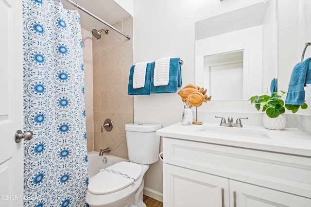 full bath with vanity and toilet