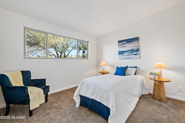 carpeted bedroom with baseboards