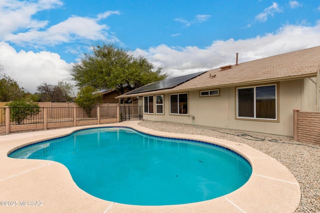 view of pool featuring a patio area, a fenced in pool, and a fenced backyard