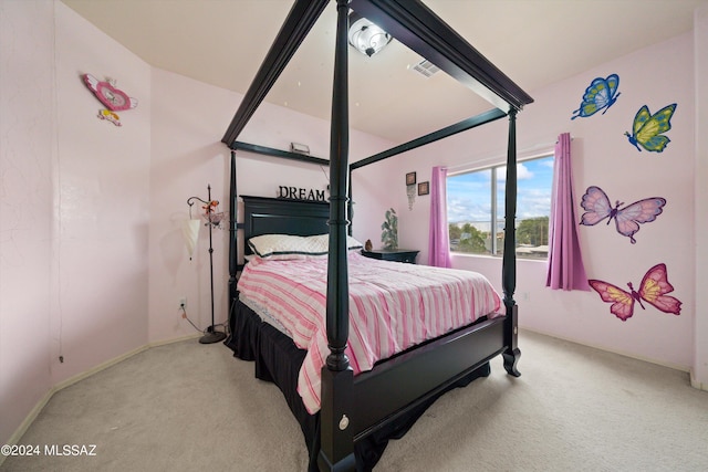 bedroom with light colored carpet