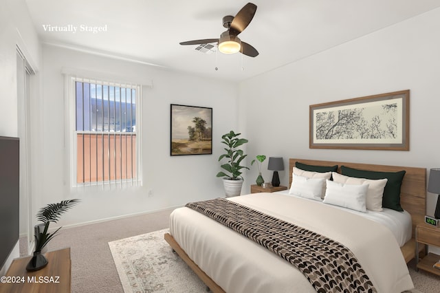 5897 E Cedarbird Dr, Tucson, AZ 85756 - carpeted bedroom featuring a ceiling fan and baseboards